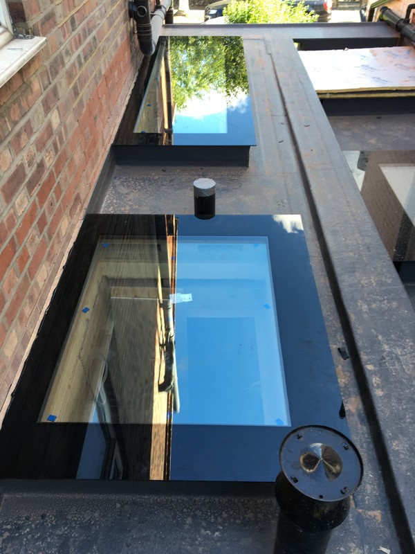 Multiple flat roof skylights on extension in Bermondsey